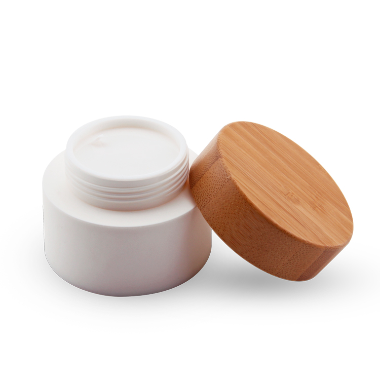 Garantia comercial de embalagem de cosméticos de bambu de luxo brilhante tampas de bambu frasco de plástico com parafuso